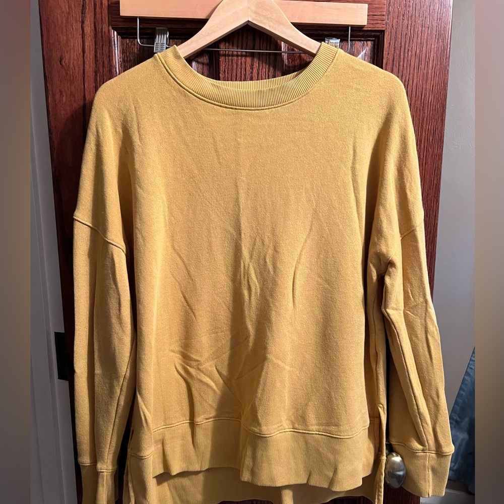Women’s size Large Time and Tru mustard sweatshirt.